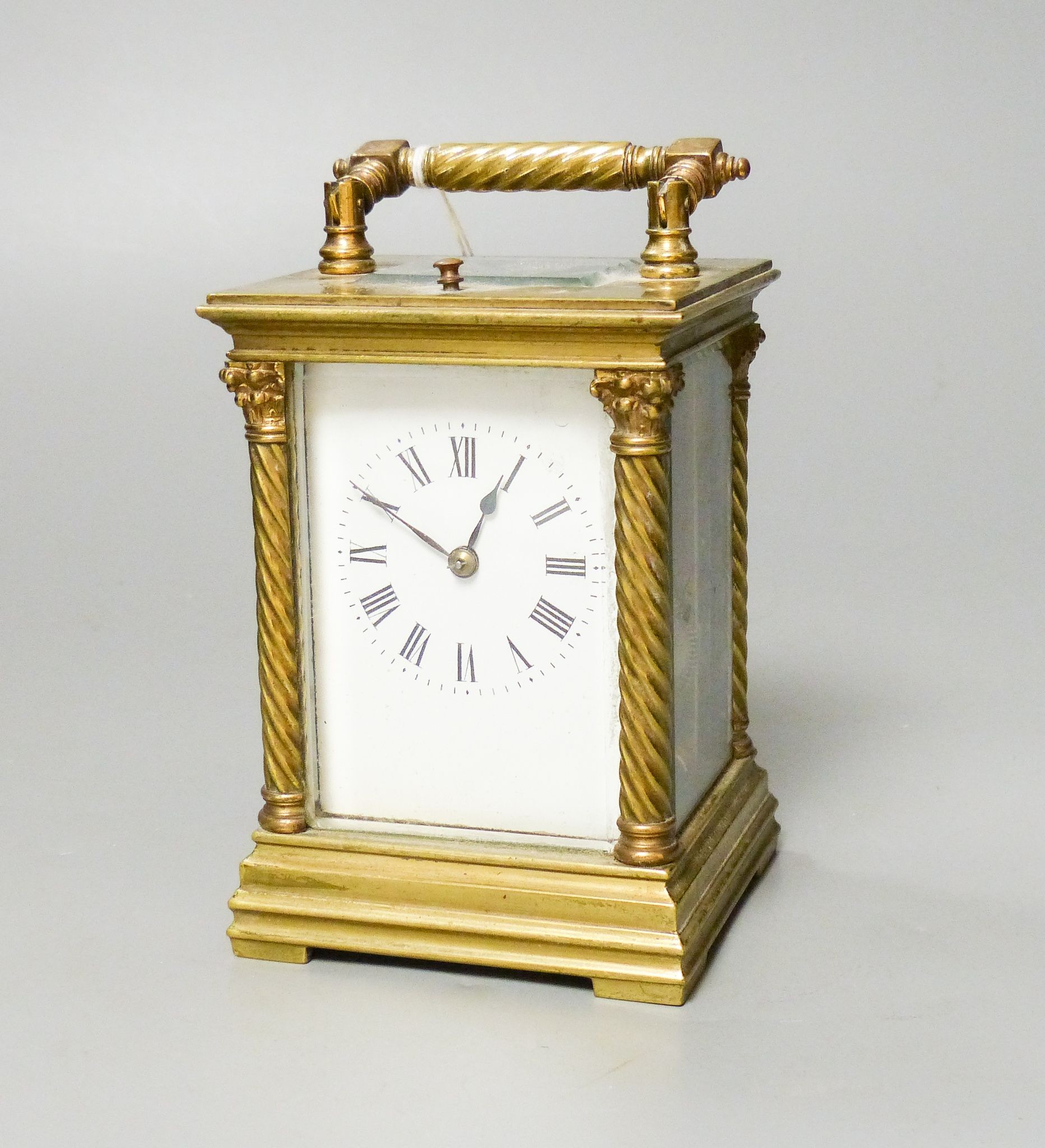 A French brass repeating carriage clock, c.1900, stamped R &Co. Paris, 15.5 cm high handle up